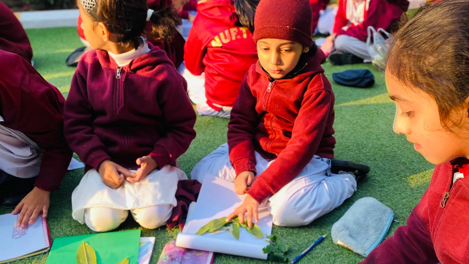 Nurture students completing a collaborative creative activity