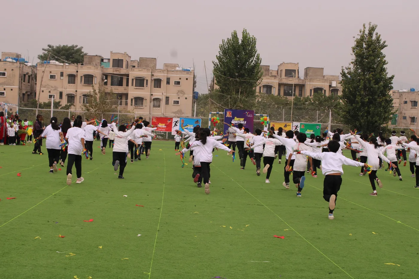 Students taking part in a large outdoor group activity